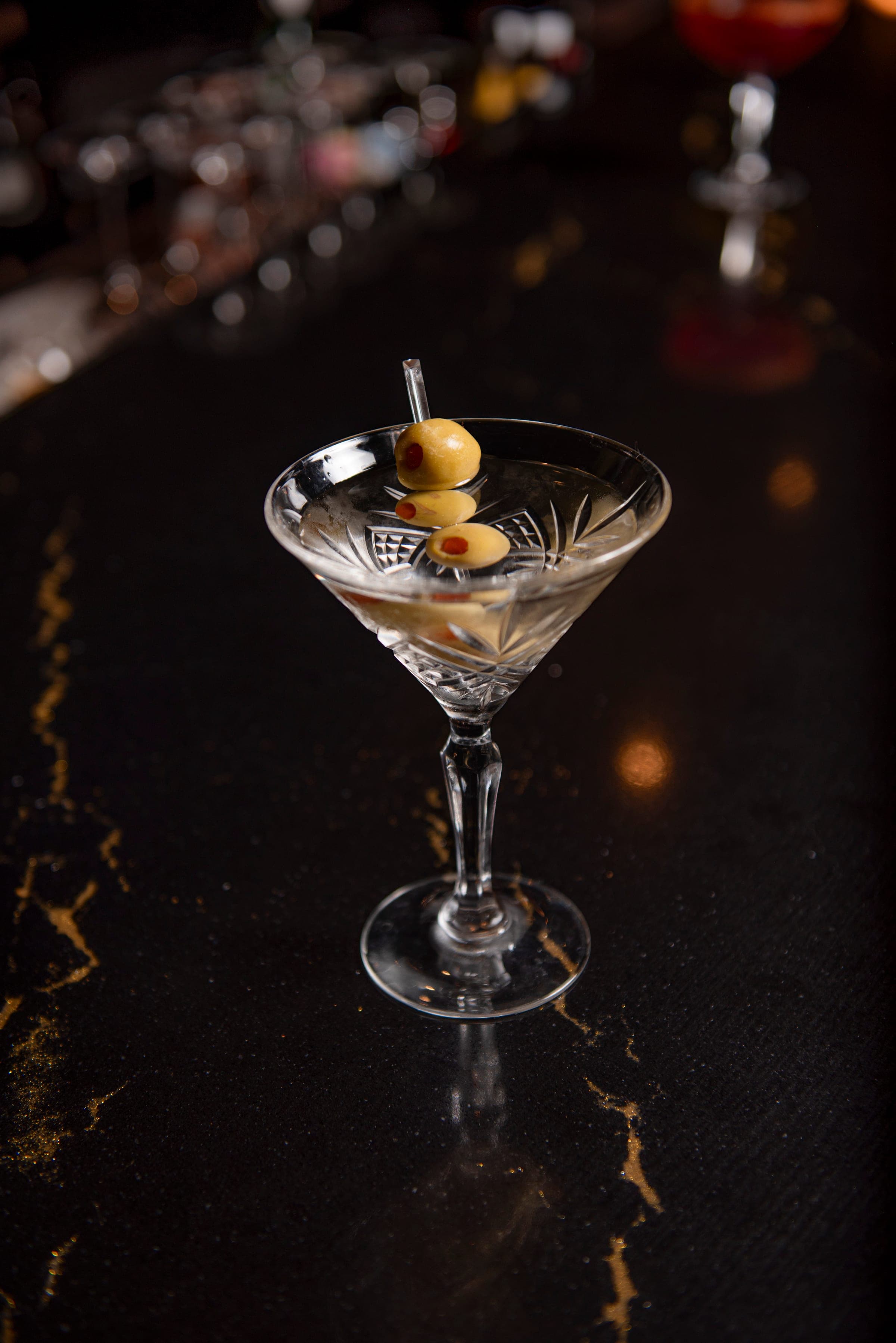 Classic dirty martini with olives at the bar during happy hour, Will's & Bill's Berwyn PA